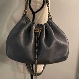 Chanel drawstring with the most beautiful hardware and wide strap